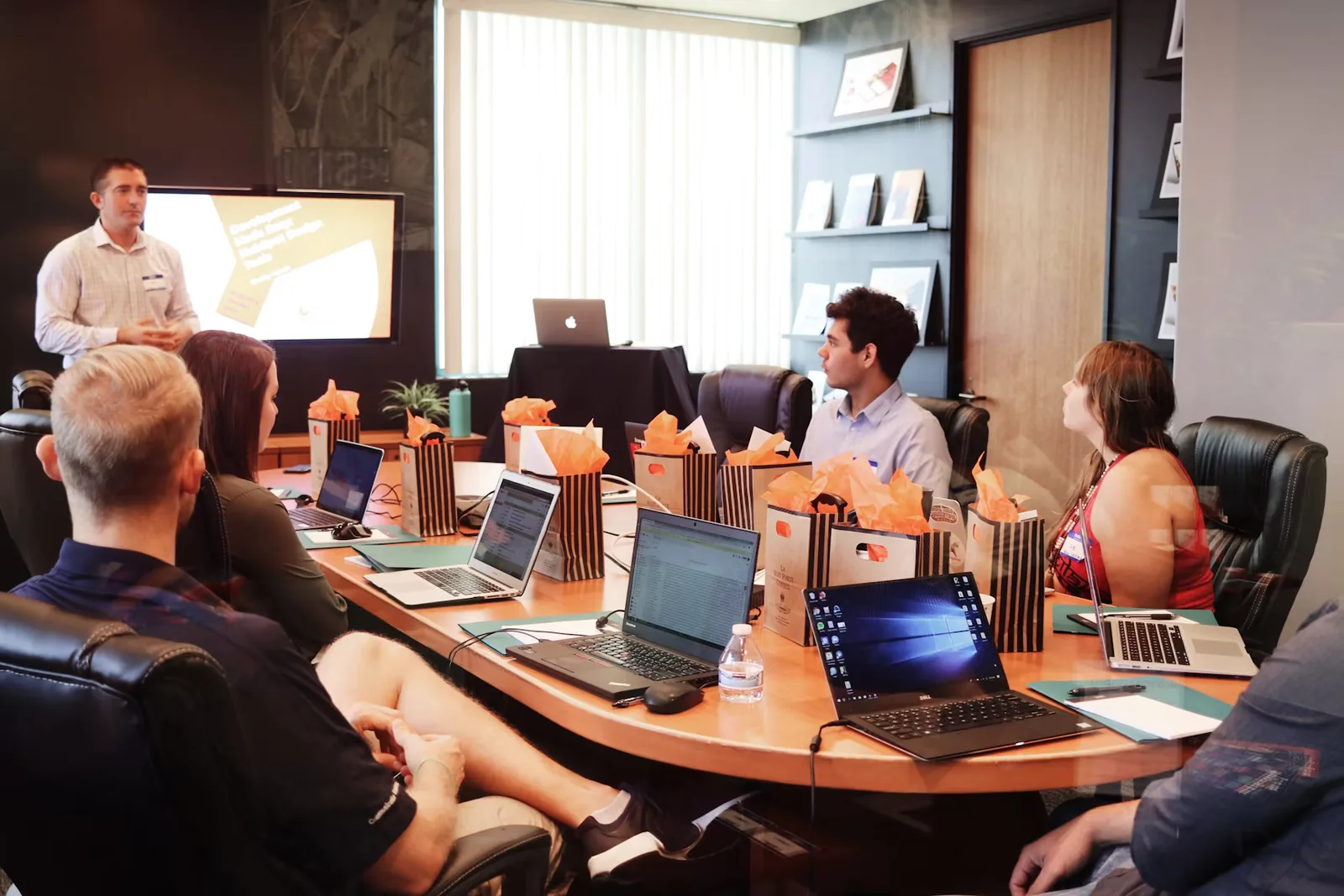 Professionals in an office meeting, BHR Group